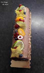 Buche De Noel Chocolat Au Lait Mangue Passion Buche De Noel Chocolat Dessert Noel Buche De Noel