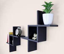 Add visual intrigue to a bare wall with the white danya b. Ballucci Criss Cross Floating Wall Shelf Set Of 2 Black Amazon In Furniture