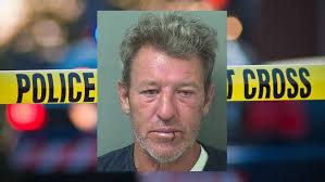 Man charged with below-the-waist nudity said he lost pants at beach