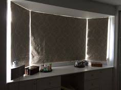 Blackout Bay Window Roman Blinds Over Built In Dressing Table Built In Dressing Table Bay Window Dressing Table In Bay Window
