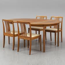 a 1950/60s teak and valnut table and