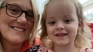 Hero police save toddler found floating face-down in her grandparents' pool 