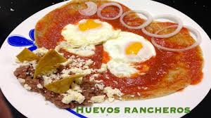 If using whole canned tomatoes, break them up with your fingers or a spatula as you put them in the pan. Huevos Rancheros Recipe How To Cook Mexican Food Youtube