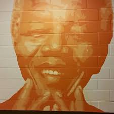 Here is the mural I will be working on: Centro de Salud Familiar La Fe