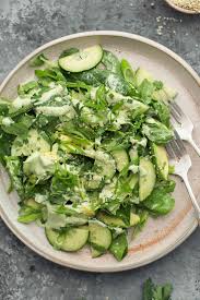 A Perfect Summer Salad Featuring Refreshing Cucumbers And Avocados Tossed With A Creamy Vegan Hemp Seed Dre Leafy Green Salad Recipes Leafy Salad Summer Salads