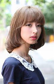Flirty Fringed Bob Feminine Curvy Hairstyles Weekly Japanese Hairstyle Hair Styles Girl Haircut