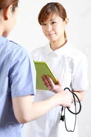 Learn japanese through the web's best videos. Young Japanese Nurse Talks With A Patient Stock Photo Picture And Royalty Free Image Image 31943206