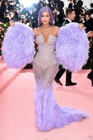Unclear, but they have definitely made their mark at the annual met gala. Kylie Jenner Matches Her Hair To Her Versace Feathers At The 2019 Met Gala Vogue
