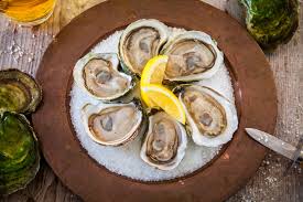 Arrange the oysters on a serving plate, stabilizing them with chipped ice or salt, if you like. Oysters On The Half Shell Best Of Sea