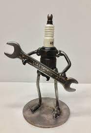 The Mechanic Junk Art Sculpture Made From Some Scrap Steel A Spark Plug And An Old Wrench Made By Brook Welding Art Metal Art Sculpture Welding Art Projects