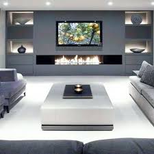 Living room with fireplace, tv, and patterned rug. Pin By Gulden Ilker On For The Home Living Room Design Modern Luxury Living Room Living Room With Fireplace