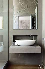 The vessel sink in the bathroom is curvy as well, but it's an elongated ellipsis rather than a circle. Turn Your Small Bathroom Big On Style With These 15 Modern Sink Designs Bathroom Design Small Modern Contemporary Bathroom Decor Bathroom Design Small
