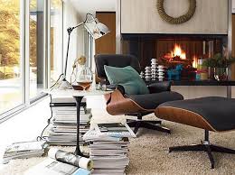 Fuller upped the ante of the man cave with a cozy yet sophisticated space; Herman Miller Eames Lounge Chair Eames Lounge Chair Eames Lounge Chair Replica Eames Lounge