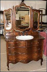Photo Of Front View Antique Bathroom Vanity Triple Mirrored Antique Dresser Antique Bathroom Vanity Country Bathroom Mirrors Shabby Chic Bathroom