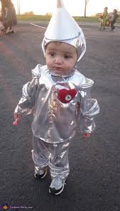 Spray paint the clothes and …. Homemade Tin Man Baby Costume