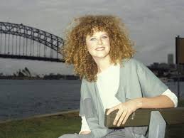 Long and curly was the style back then. Celebrity Hairstyles From The 80s You Completely Forgot About