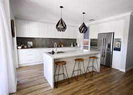 Kitchens By Emanuel Island Benchtop With Waterfall Edging Featured In Our Concreto Avorio A Refined Ver Fresh Kitchen Cost Of Kitchen Cabinets Kitchen Decor