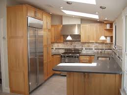 Refrigerateur Encastrable Harmonie Parfaite Dans La Cuisine Armoires De Cuisine Sur Mesure Cuisine Artisanale Cuisines Design