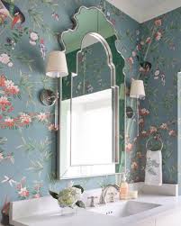 In a small powder room without much access to natural light—for example, a windowless space under the stairs—embrace the moodier, edgier atmosphere with darker in this powder room designed by tamsin johnson, the concrete floors, inky marble sink and modern wallpaper set the right mood. Schumacher Wallpaper Powder Room Design Ideas L A Design Concepts