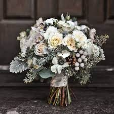 Winter is such an enchanting time of year to tie the knot. Wedding Flowers Bouquets Winter Wedding Flowers Winter Bridal Bouquets Silver Winter Wedding