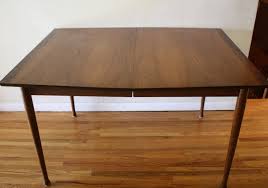 The sofa table or dining table was made of beech, pressboard, formica, metal and brass. Mid Century Modern Surfboard Dining Tables Picked Vintage