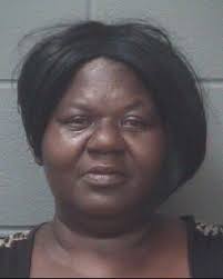 Woman accused of bribing teens with weed