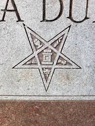 Tombstone pentagram for a nice lady named Viola who died in 1948 but Ive  never seen anything like it and cant figure out the symbology and Dan  Brown isnt returning my texts. :