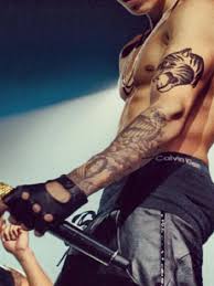 «also all of my tattoos will be available. Justin Biebers Tattoos Und Ihre Bedeutungen