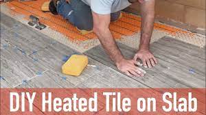 Make sure the cold floors are sealed and are warm to touch. Diy Heated Tile Floor On Slab Youtube