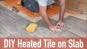 Ft.) a gentle electric radiant heat system designed a gentle electric radiant heat system designed specifically for dry installation under floating wood and laminate floors. Diy Heated Tile Floor On Slab Youtube