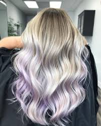 Purple also represents meanings of ambition, creativity, wisdom, dignity, grandeur, devotion, peace, pride, mystery, independence, and magic. Subtle Purple Highlights On Blonde Hair