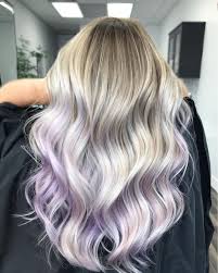 It features a natural copper color with purple peekaboos that add some sparkle. Subtle Purple Highlights On Blonde Hair
