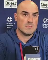 Maybe the answer is don't call designed runs. If he scrambles he can slide.  If he's a running back he'll get whacked hard.