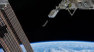 Station Deploys Tiny Satellites During Ongoing Spacewalk Preps Space Station