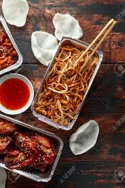 Check spelling or type a new query. Chinese Takeaway Food Crispy Shredded Beef Sweet And Sour Chicken Wings Egg Noodles With Bean Sprouts Pineapple Chilli Dip And Prawn Crackers Stock Photo Picture And Royalty Free Image Image 119397468