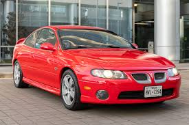 Image result for Medium Red 2004 Pontiac