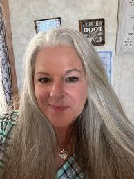 What hairstyle would be suitable for a nurse with long hair?