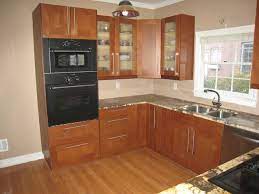 If you're looking for contemporary styles (with non paneled doors), you'll find quite a few here. Ikea Grimslov Cabinets With Brown Interior Google Search Kitchen Remodel Kitchen Design Home Decor Styles