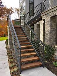 Wherever outdoor stairs are desired or required, wherever outdoor stairs are desired or required, count on this durable stair stringer. Finelli Architectural Iron And Stairs Custom Handmade Exterior Wood And Iron Staircase Made In Clev Exterior Stair Railing Outdoor Stair Railing Outdoor Stairs