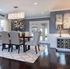 The wall between the living and dining room was removed. Dining Room Decor Dining Room Furniture That Will Elevate Your Dining Room Lighting Design Www D Elegant Dining Room Farmhouse Dining Room Dining Room Walls