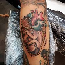 Women show more interest to get tattoos of hearts. 100 Lovely Heart Tattoos With Meanings And Ideas Body Art Guru