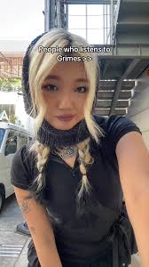 Guy Listening to Grimes