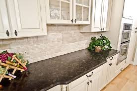 Leathered Antique Brown Granite And River Valley Granite Vienna Va 17 Travert Brown Granite Countertops Traditional Kitchen Cabinets White Brick Backsplash
