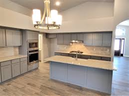 A light to medium shade will pair beautifully with butcher block or quartz countertops, and will feel a bit. Grey Themed New Kitchen Rassette Homes Grey Kitchen Cabinets Kitchen Island Lighting Grey Cabinets