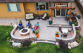 Backyard retaining wall fire pit. Country Style Patio With Flowing Lines In Frederick Colorado Rock N Roll Stoneworks