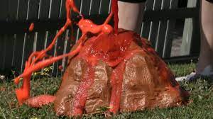 Use a spoon to mix the baking soda slurry until it is all a liquid. How To Make An Erupting Volcano Youtube