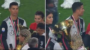 Cristiano ronaldo shows off latest trophy with serie a player of the year cristiano ronaldo has added yet another trophy to his ever growing collection the portugal superstar was named serie a player of the year in italian football Cristiano Ronaldo Accidentally Hit His Son And Girlfriend With Serie A Trophy Sportbible