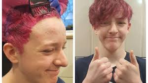 Fundraiser Jake smashes target as he dyes his hair pink for charity