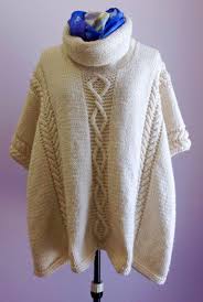 With minimal shaping, this is suitable project for a beginner knitter who wants to try cables. Aran Poncho Knitting Pattern