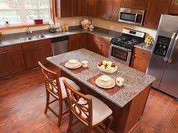 Why didn't they just cut the floor around the toe kick footprint for the new cabs? Laminate Flooring In The Kitchen